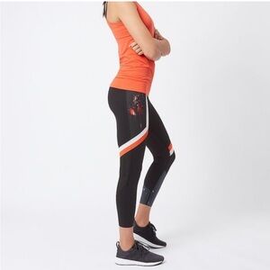 Sweaty Betty Leggings in Black with Orange and White Accents